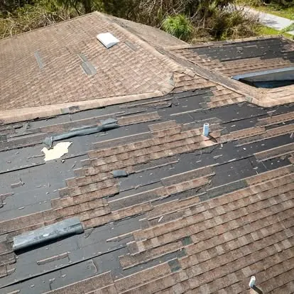 Roof inspector documenting storm damage